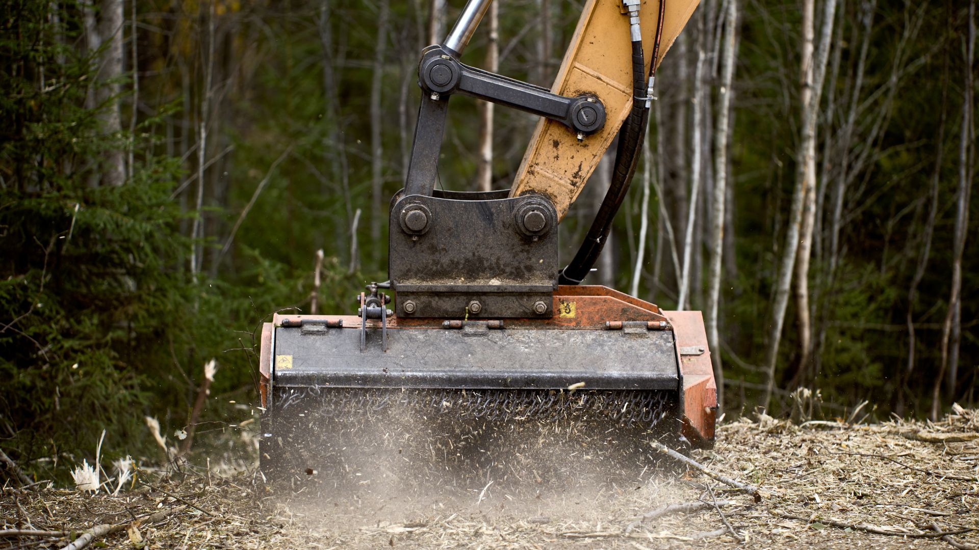 A machine that is sitting in the dirt