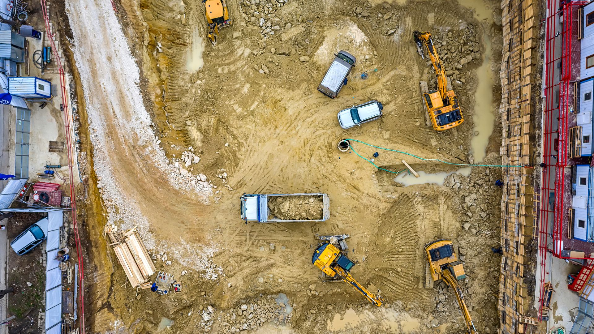 An aerial view of a construction site with construction equipment